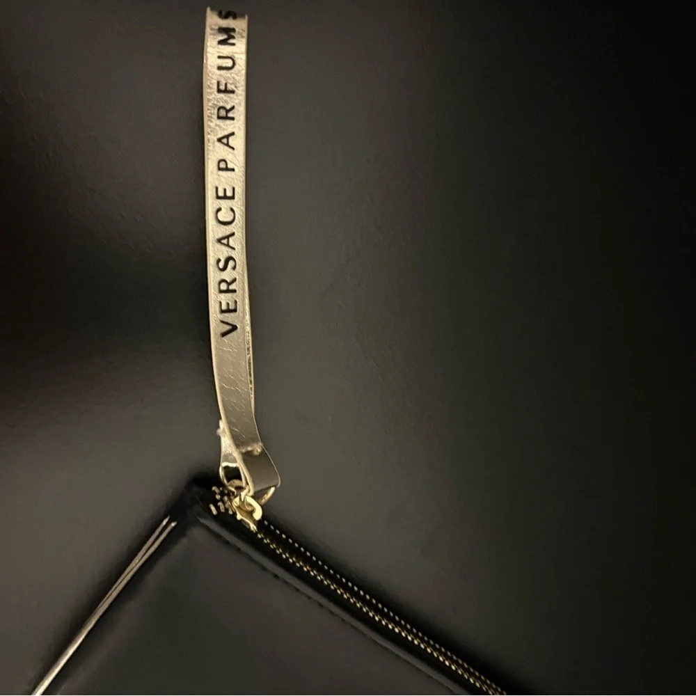 Versace Perfums Black Leather Wristlet with Gold Accents
